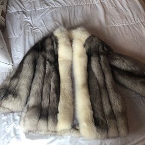 Fox fur coat fully lined. Impeccable condition